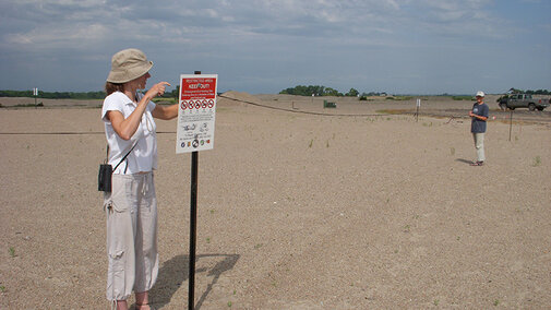 Putting up keep out signs 